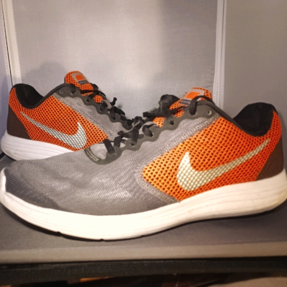 Mens Nike Revolution running shoes siz 12 orange